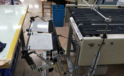 自動收料裝置在服裝加工粘襯技術中的應用