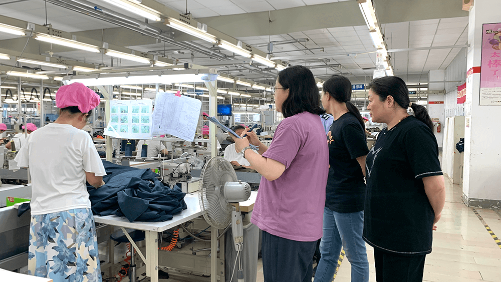 劉潭服裝順利通過ISO三體系續(xù)證審核