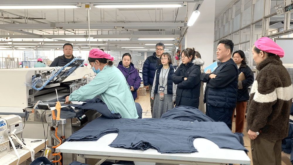 劉潭服裝熱情接待良品客戶參觀考察：共謀合作發(fā)展新篇章