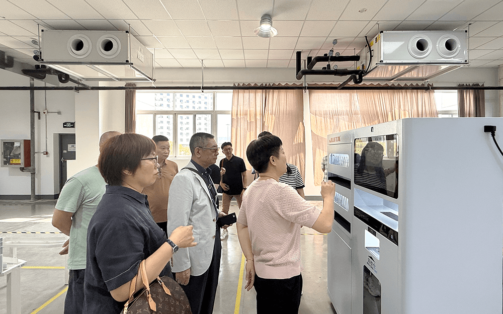智能賦能，合作共贏：日本客戶參觀劉潭服裝智能車間