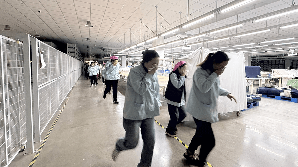 以練筑防安全護(hù)航｜劉潭服裝開展全員應(yīng)急疏散演練